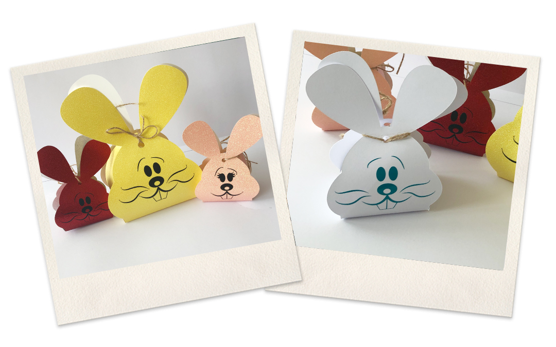 Zwei Polaroids mit selbst gebastelten Hasenkörbchen aus Glitzerkarton in Rot, Gelb, Rosé und Weiß, Gesichter aus Folie, Ohren mit Kordel gebunden
